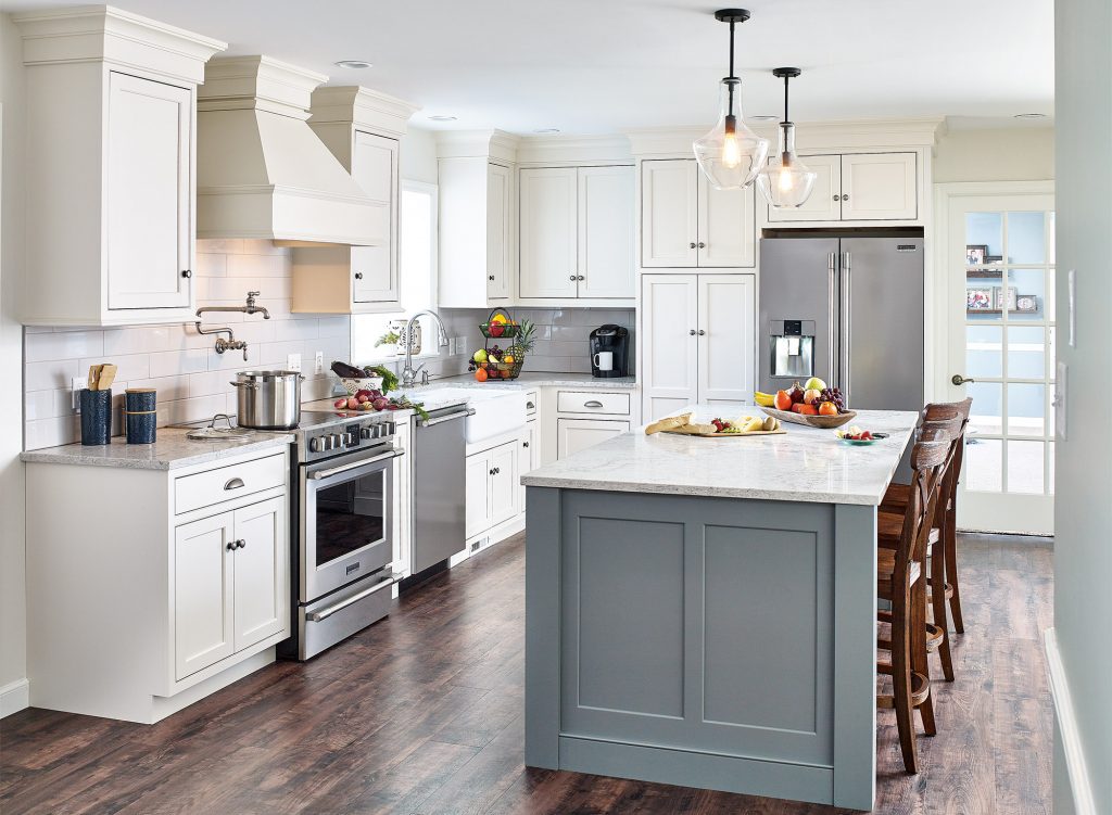 Elegant kitchen featuring a built-in fridge cabinet for a seamless look