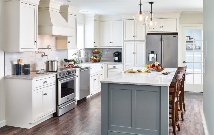 Elegant kitchen featuring a built-in fridge cabinet for a seamless look