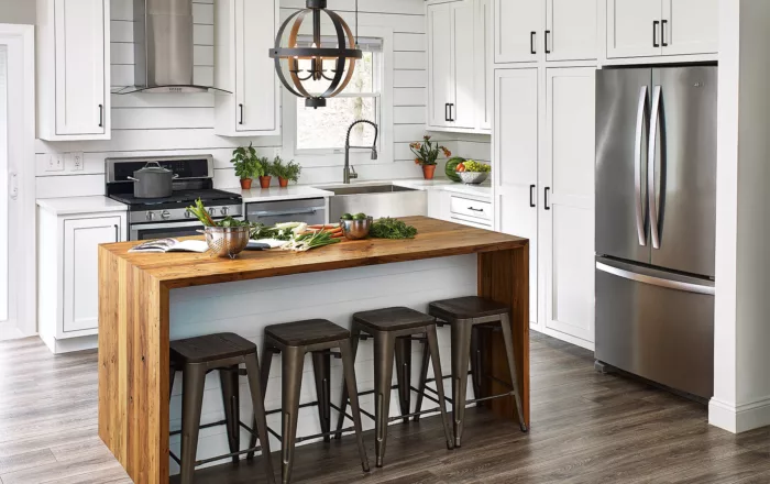 Elegant kitchen featuring a built-in fridge cabinet for a seamless look