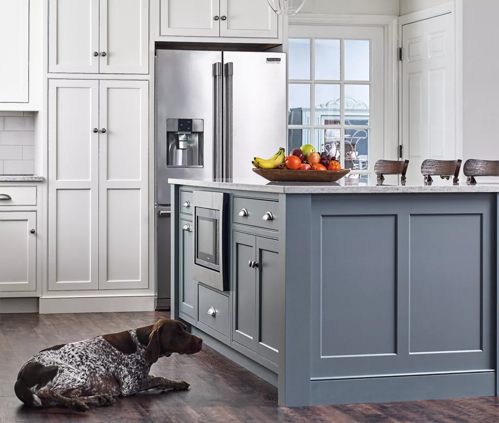 Elegant kitchen featuring a built-in fridge cabinet for a seamless look