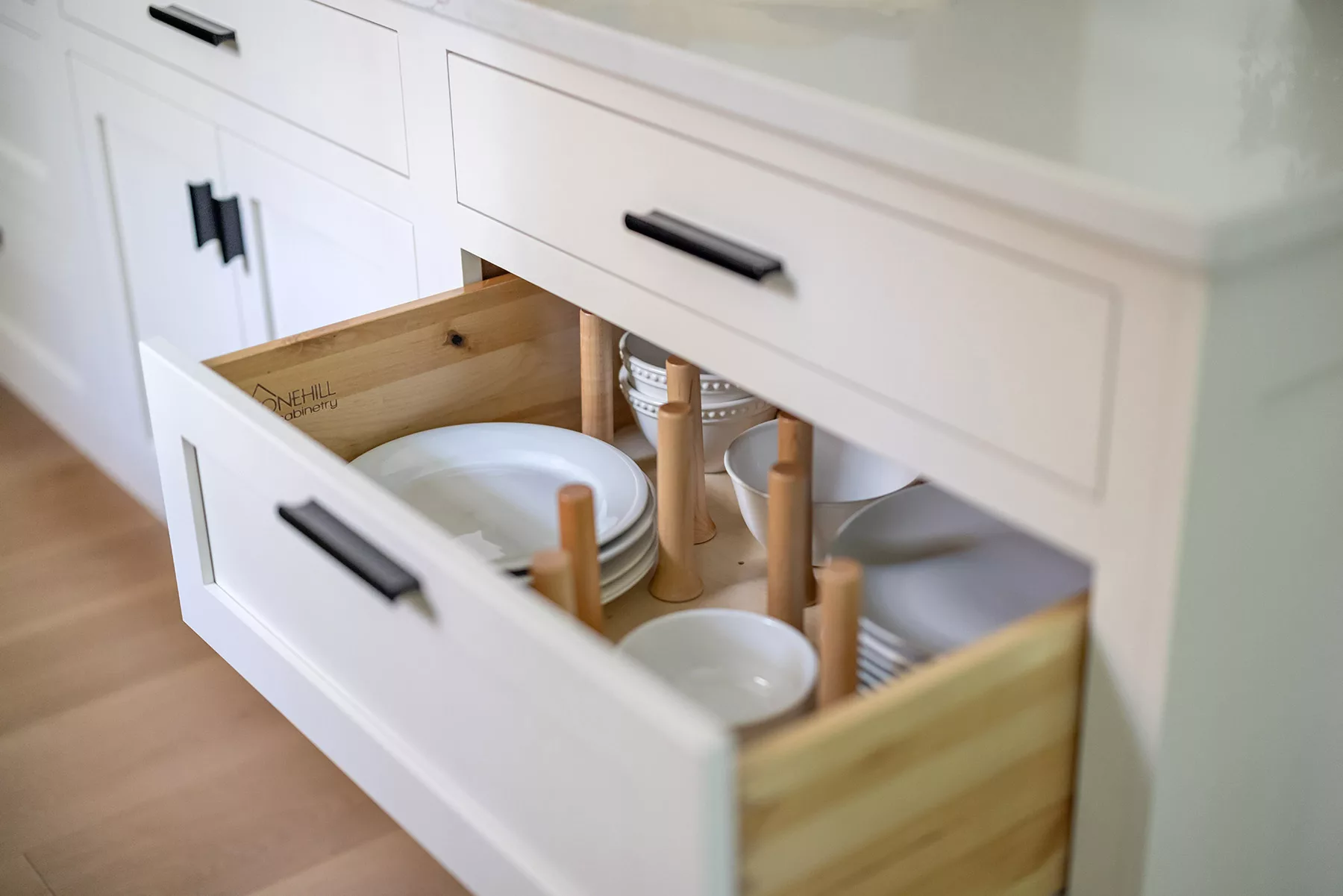 Closeup of a drawer with plates