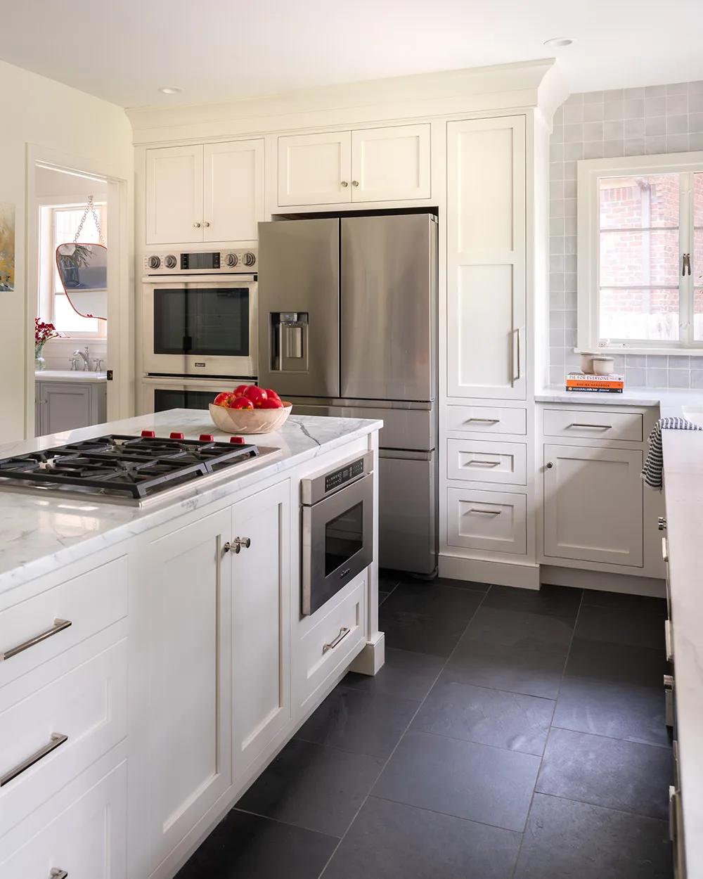 Light colored painted custom cabinets in a kitchen