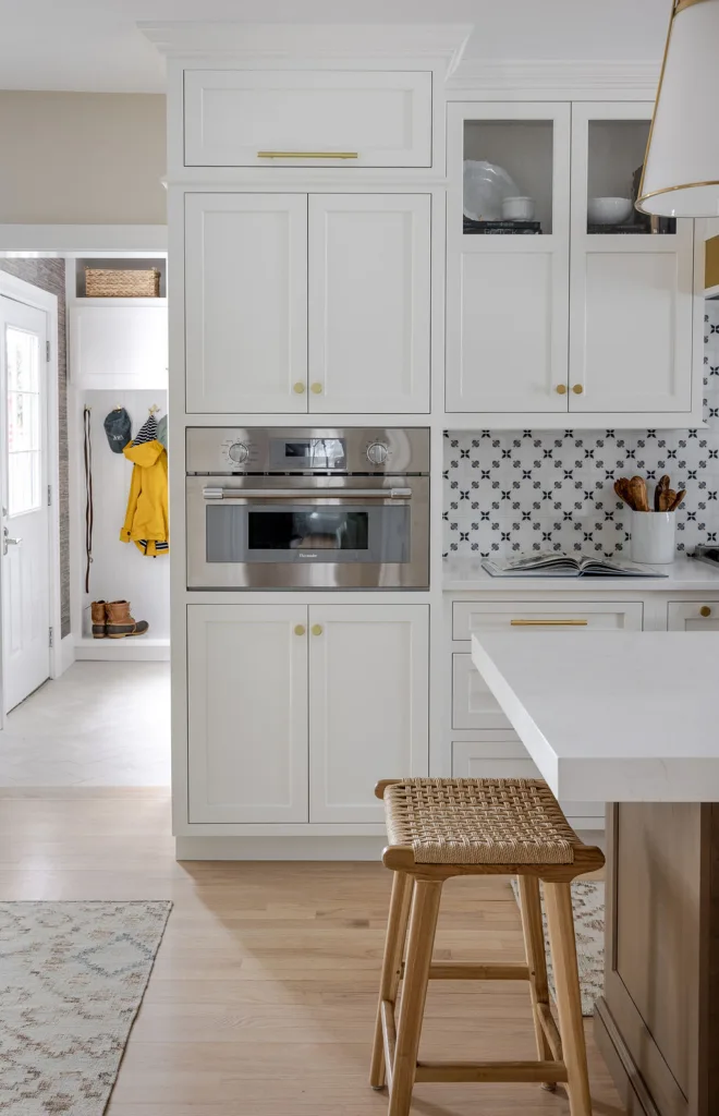 Semi-custom kitchen cabinets that are painted a light color